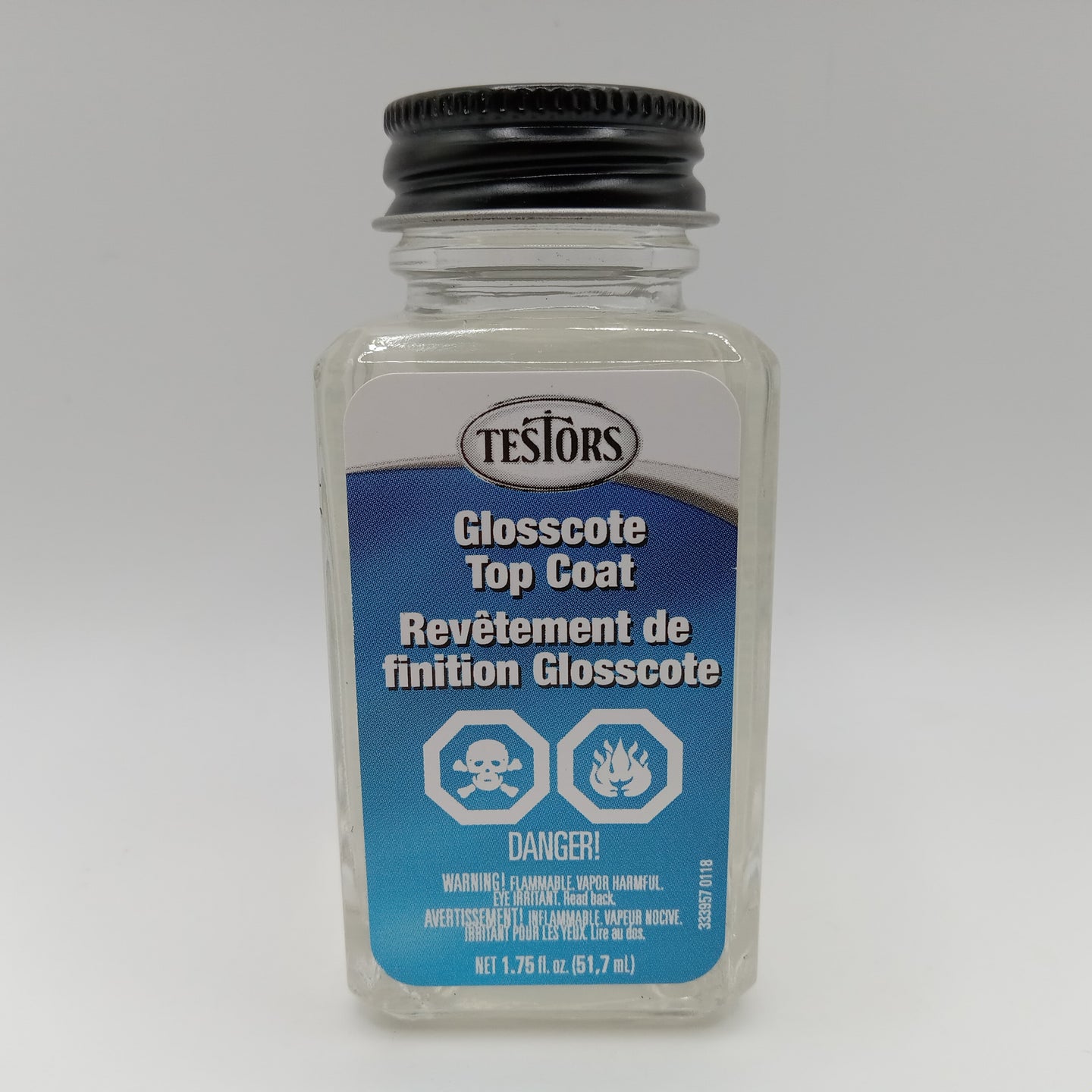 Bottle of Testors Glosscote Top Coat on a white background