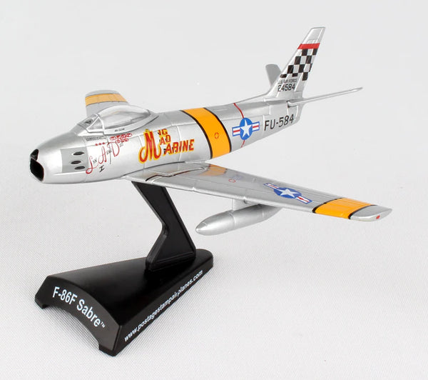 Model of an F-86F Sabre airplane on a white background