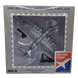 Boxed diecast metal historical airplane model with display stand and postage stamp collection label.