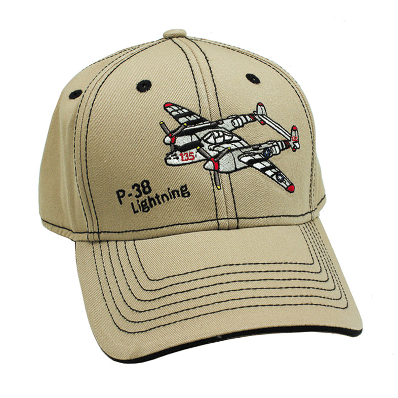 A beige baseball cap with an embroidered design of the P-38 Lightning aircraft.