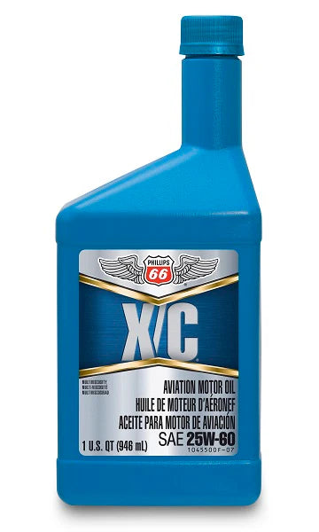 Blue bottle of X/C aviation motor oil with a visible label on a white background