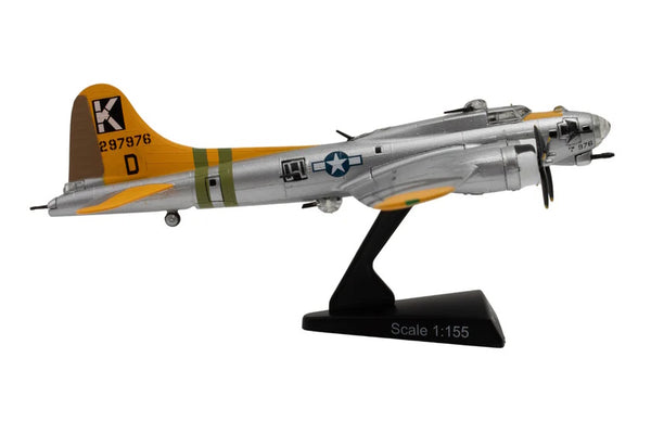 Model airplane on a stand with a white background