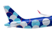 Model airplane with colorful design on a white background