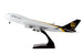 Model airplane with UPS logo on a white background