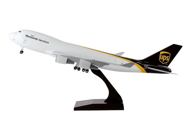 Model airplane with UPS logo on a white background