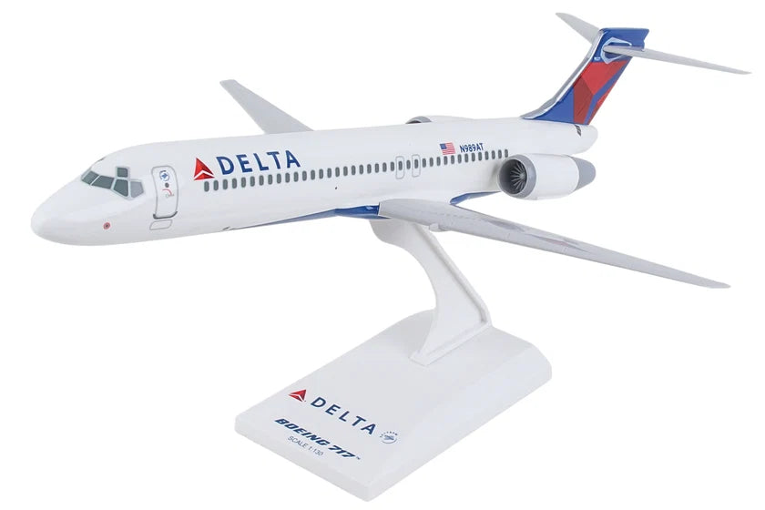 Model airplane with Delta Airlines branding on a white background