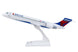 Model airplane with Delta Airlines branding on a white background
