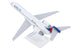 A white Delta Airlines model jet airplane on a white display stand, photographed against a solid white background.
