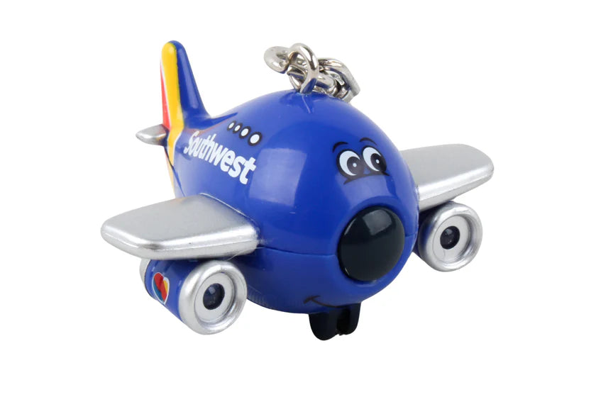Blue airplane-shaped keychain with Southwest Airlines logo on a white background
