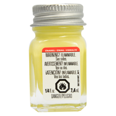A 1/4 oz bottle of Testors gloss light yellow enamel paint with a warning label on the cap.