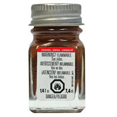 A bottle of Testors Gloss Light Brown Enamel Paint in a 1/4 oz container with a warning label on the cap.