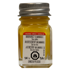 A bottle of Testors TES1169TT Flat Yellow Enamel Paint in a 1/4 oz glass bottle with a label and cap.