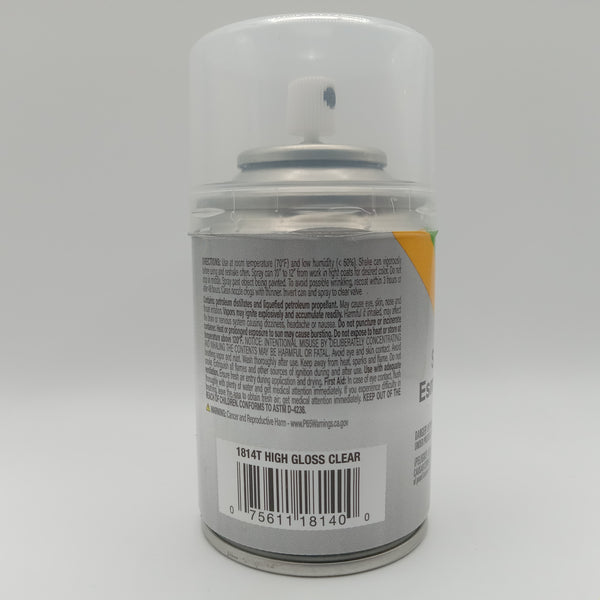 Spray paint can with label on a gray background