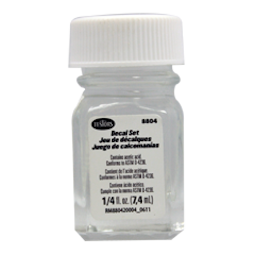 Small container of decal set with a white cap on a white background
