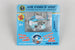 Toy airplane keychain in packaging with 'Air Force One' branding on a gray background