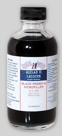 A 4oz. bottle of Alclad II Black Primer & Microfiller for model building.