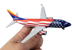 Model airplane with American flag design held by a hand on a white background