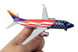 Model airplane with American flag design held by a hand on a white background