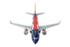 Model airplane with a colorful design on a white background