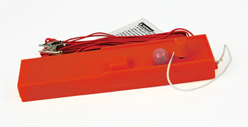 Red electronic device with wires on a white background