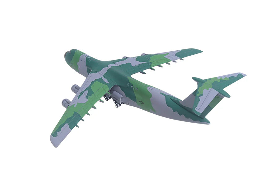 Camouflage-patterned airplane model on a white background