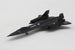 A black U.S. Air Force model jet model airplane on a light gray textured background.