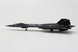 A scale model of a black U.S. Air Force SR-71A Blackbird jet, shown from a side profile view on a light gray background.