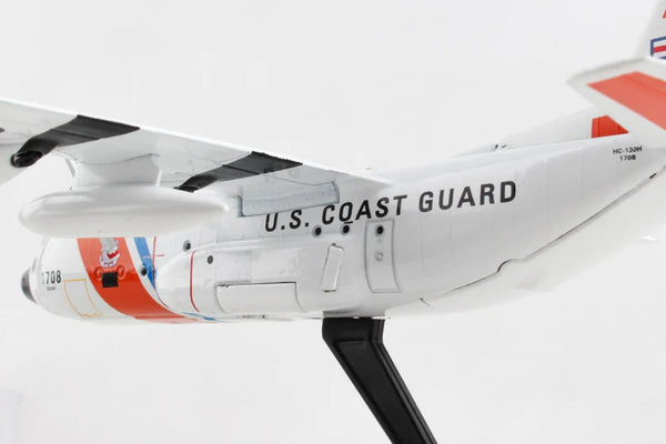 Model of a U.S. Coast Guard aircraft on a white background