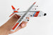 Model airplane held in a hand with a plain background