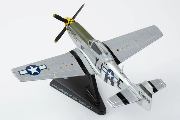 Model airplane with a propeller on a white background