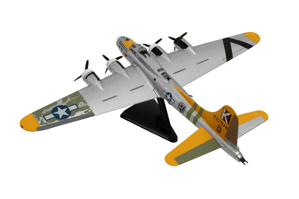 Model airplane with a white, yellow, and black color scheme on a white background