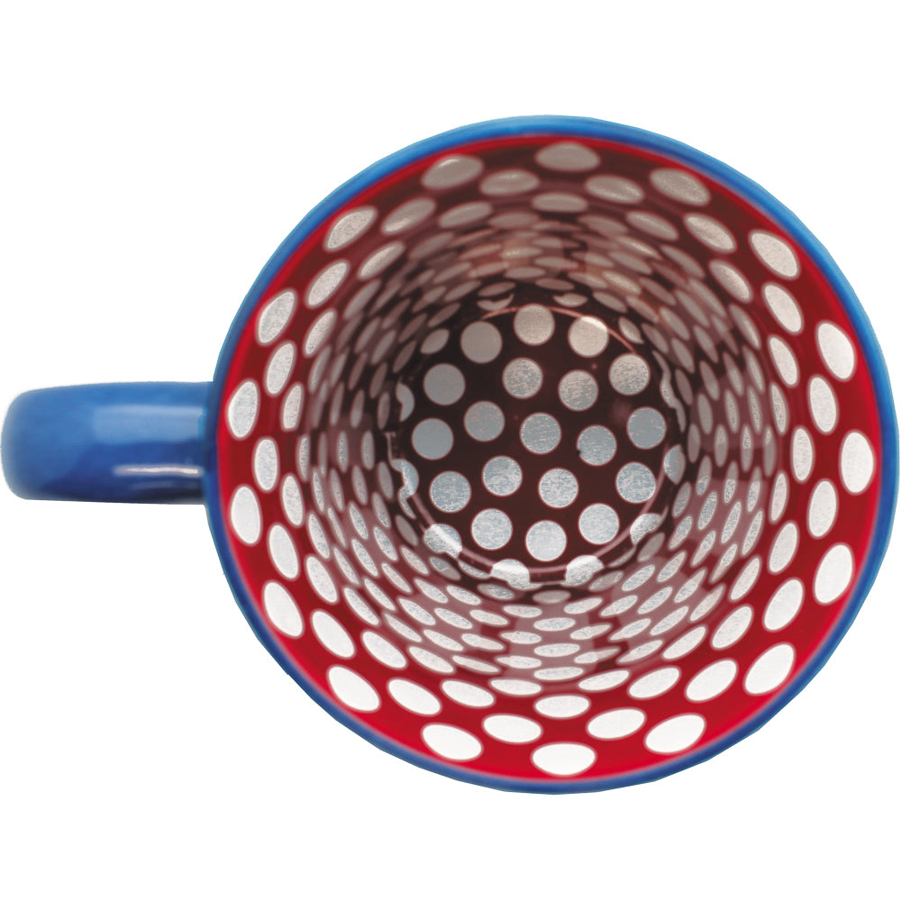 A ceramic coffee mug with a yellow background and blue handle, featuring a bright red and white Polka Dot pattern on the inside.
