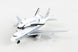 A diecast model toy of a United States Space Shuttle attached to a white and blue Boeing 747 passenger aircraft, photographed on a light gray background.