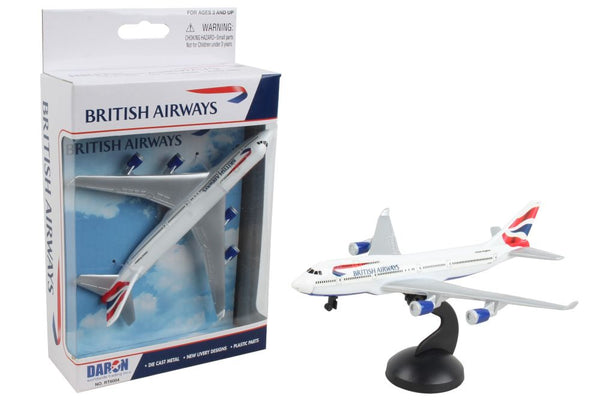 A toy model of a British Airways 747 aircraft, predominantly white with blue and red accents, packaged in a box with a clear display window.
