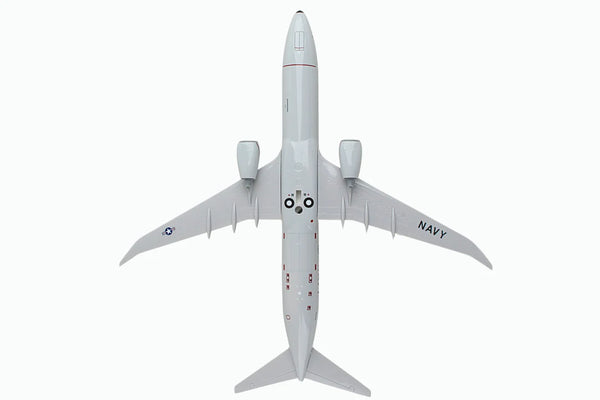 Model airplane with 'Navy' marking on a white background