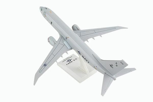 Model of a military aircraft with 'Navy' branding on a white background