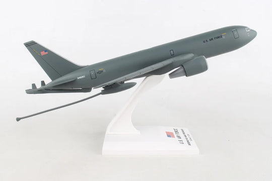 Model of a military aircraft on a white stand with a visible brand name.
