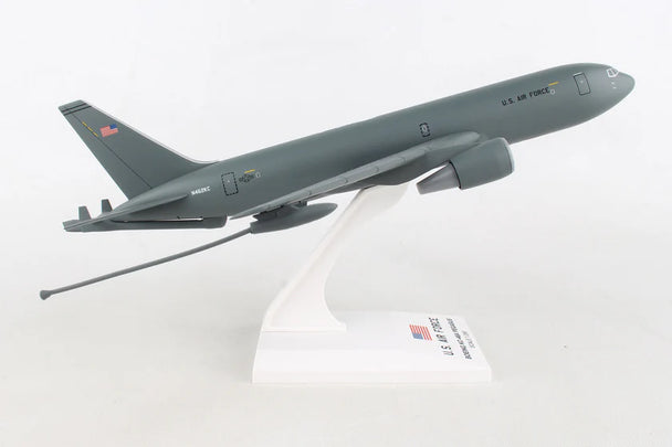 Model of a military aircraft on a white stand with a visible brand name.