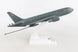 Model of a military aircraft on a white stand with a visible brand name.