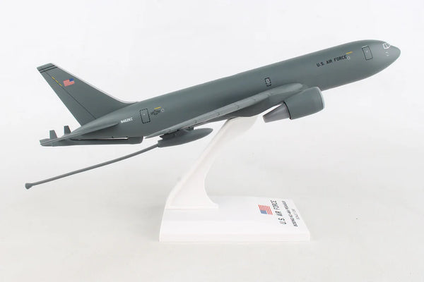 Model of a military aircraft on a white stand with a visible brand name.