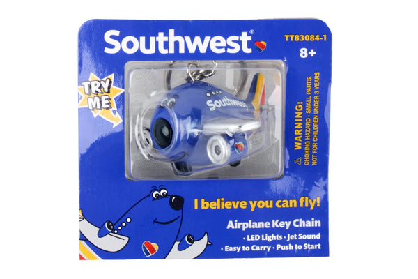 Southwest Airlines airplane keychain in packaging with branding and product details.